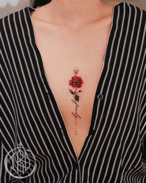 small rose tattoo between breast|50 Rose Tattoo Ideas to Inspire Your Next Ink